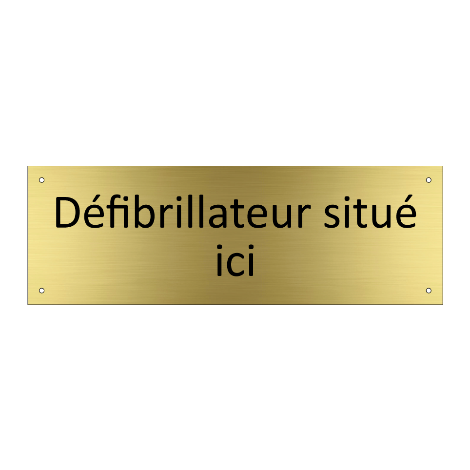 Défibrillateur situé ici