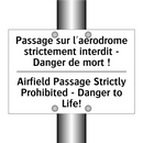 Passage sur l'aérodrome strictement  /.../ - Airfield Passage Strictly Prohibited  /.../