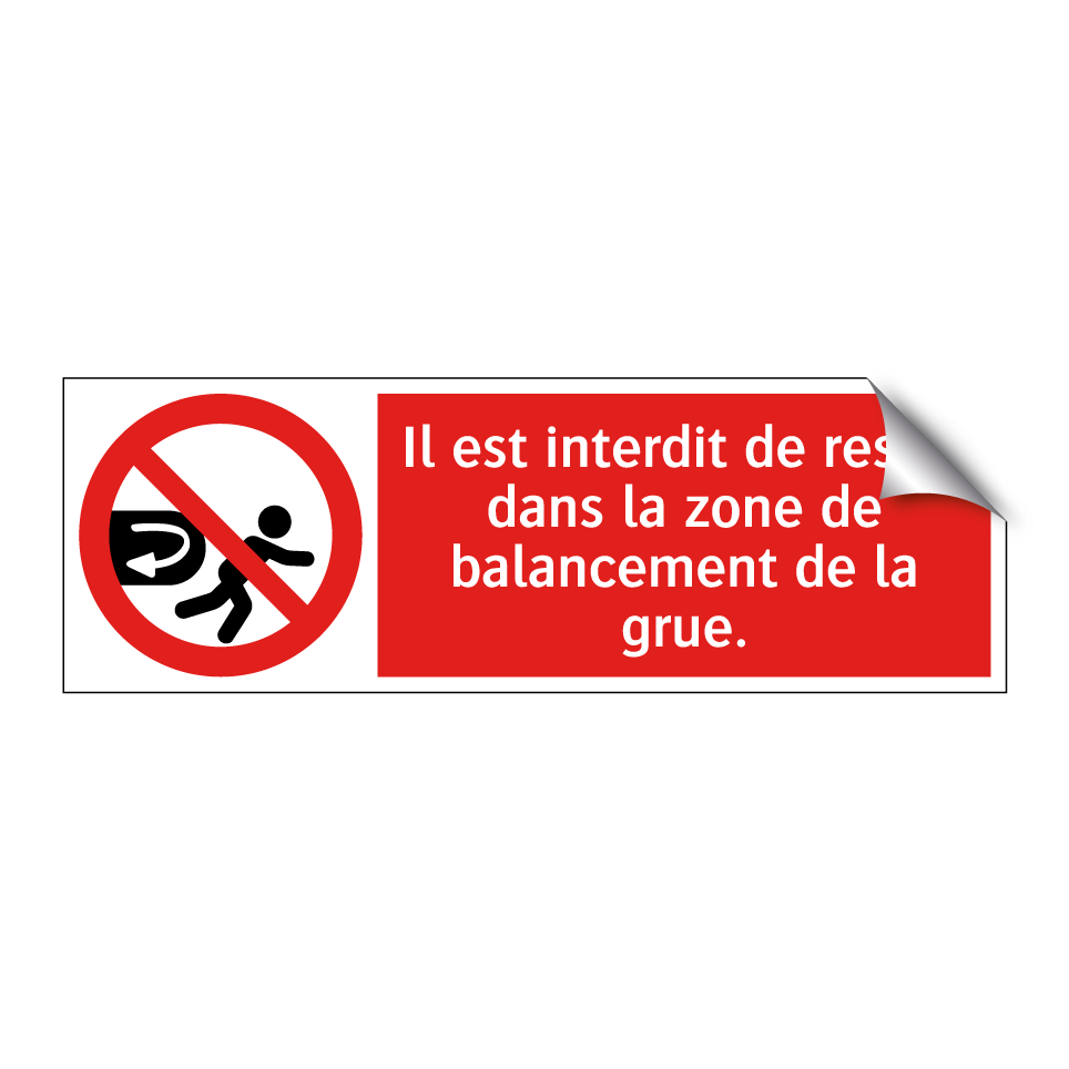 Il est interdit de rester dans la zone de balancement de la grue.