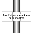 Pas d'objets métalliques ni de montres