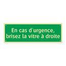 En cas d'urgence, brisez la vitre à droite