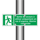 Sortie de secours à utiliser uniquement en cas d'urgence. Alarme connectée