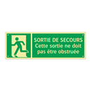 SORTIE DE SECOURS Cette sortie ne doit pas être obstruée