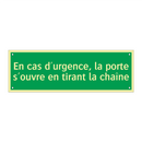 En cas d'urgence, la porte s'ouvre en tirant la chaîne