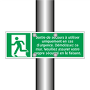 Sortie de secours à utiliser uniquement en cas d'urgence. Démolissez ce mur. Veuillez assurer votre propre sécurité en le faisant.