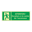 ATTENTION ! Escaliers à la sortie de l'ascenseur