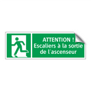 ATTENTION ! Escaliers à la sortie de l'ascenseur