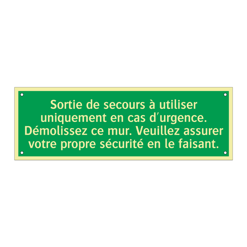 Sortie de secours à utiliser uniquement en cas d'urgence. Démolissez ce mur. Veuillez assurer votre propre sécurité en le faisant.