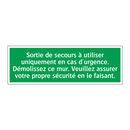 Sortie de secours à utiliser uniquement en cas d'urgence. Démolissez ce mur. Veuillez assurer votre propre sécurité en le faisant.