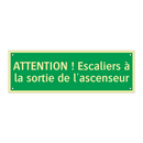 ATTENTION ! Escaliers à la sortie de l'ascenseur