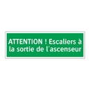 ATTENTION ! Escaliers à la sortie de l'ascenseur