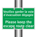 Veuillez garder la voie d'évacuation /.../ - Please keep the escape route clear /.../