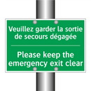 Veuillez garder la sortie de secours /.../ - Please keep the emergency exit /.../