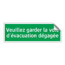 Veuillez garder la voie d'évacuation dégagée