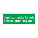 Veuillez garder la voie d'évacuation dégagée