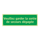 Veuillez garder la sortie de secours dégagée