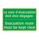 La voie d'évacuation doit être /.../ - Evacuation route must be kept /.../