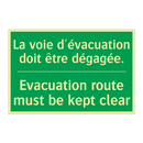 La voie d'évacuation doit être /.../ - Evacuation route must be kept /.../
