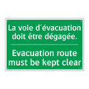 La voie d'évacuation doit être /.../ - Evacuation route must be kept /.../