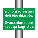 La voie d'évacuation doit être /.../ - Evacuation route must be kept /.../