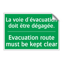 La voie d'évacuation doit être /.../ - Evacuation route must be kept /.../