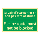 La voie d'évacuation ne doit pas /.../ - Escape route must not be blocked /.../