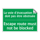 La voie d'évacuation ne doit pas /.../ - Escape route must not be blocked /.../