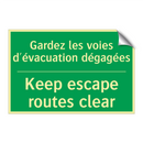 Gardez les voies d'évacuation /.../ - Keep escape routes clear