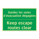 Gardez les voies d'évacuation /.../ - Keep escape routes clear