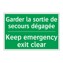 Garder la sortie de secours dégagée /.../ - Keep emergency exit clear