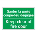 Garder la porte coupe-feu dégagée /.../ - Keep clear of fire door