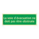 La voie d'évacuation ne doit pas être obstruée
