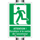 ATTENTION ! Escaliers à la sortie de l'ascenseur