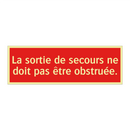 La sortie de secours ne doit pas être obstruée.