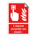 L'alarme incendie est située :