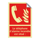 Le téléphone d'alarme incendie est situé :