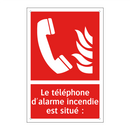 Le téléphone d'alarme incendie est situé :