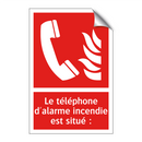 Le téléphone d'alarme incendie est situé :