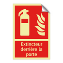Extincteur derrière la porte