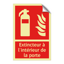 Extincteur à l'intérieur de la porte