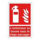 L'extincteur se trouve sous le siège passager.