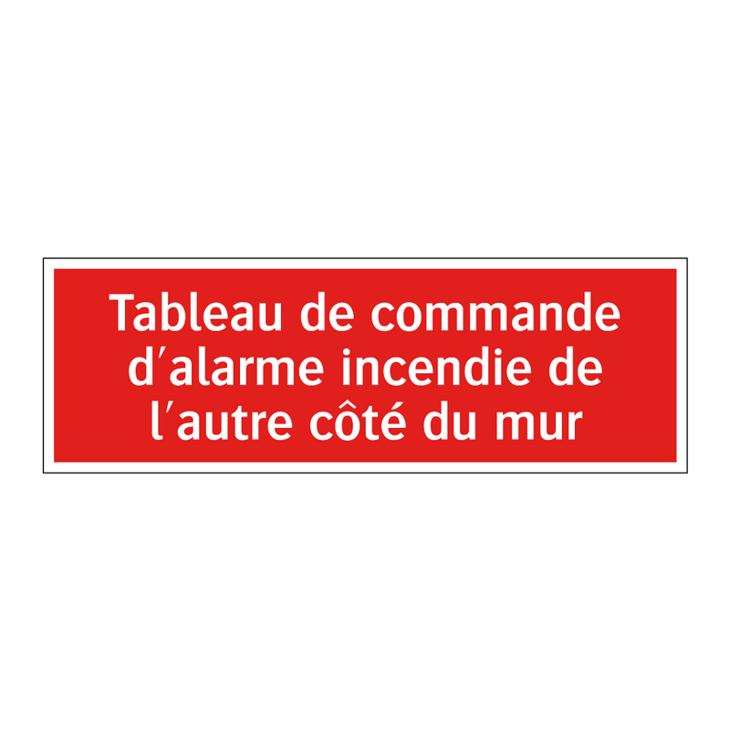 Tableau de commande d'alarme incendie de l'autre côté du mur