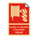 Garder le dévidoir d'incendie dégagé