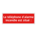 Le téléphone d'alarme incendie est situé :