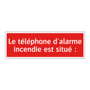 Le téléphone d'alarme incendie est situé :