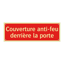 Couverture anti-feu derrière la porte