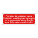 Fermeture de protection contre l'incendie. La présence de personnes et le placement d'objets dans la zone de fermeture sont interdits.
