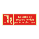 La sortie de secours ne doit pas être obstruée.