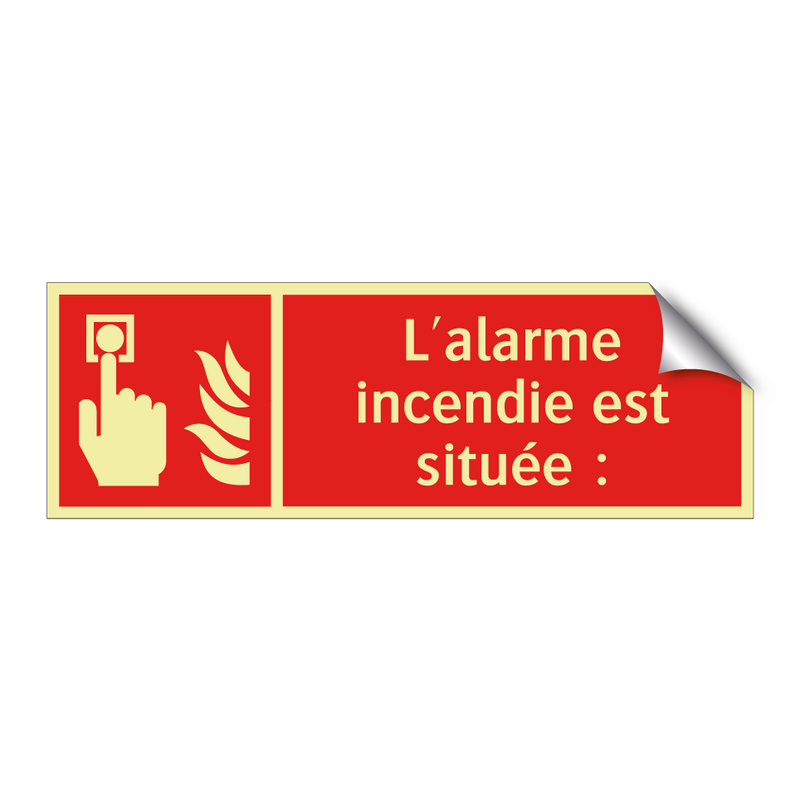 L'alarme incendie est située :