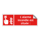 L'alarme incendie est située :